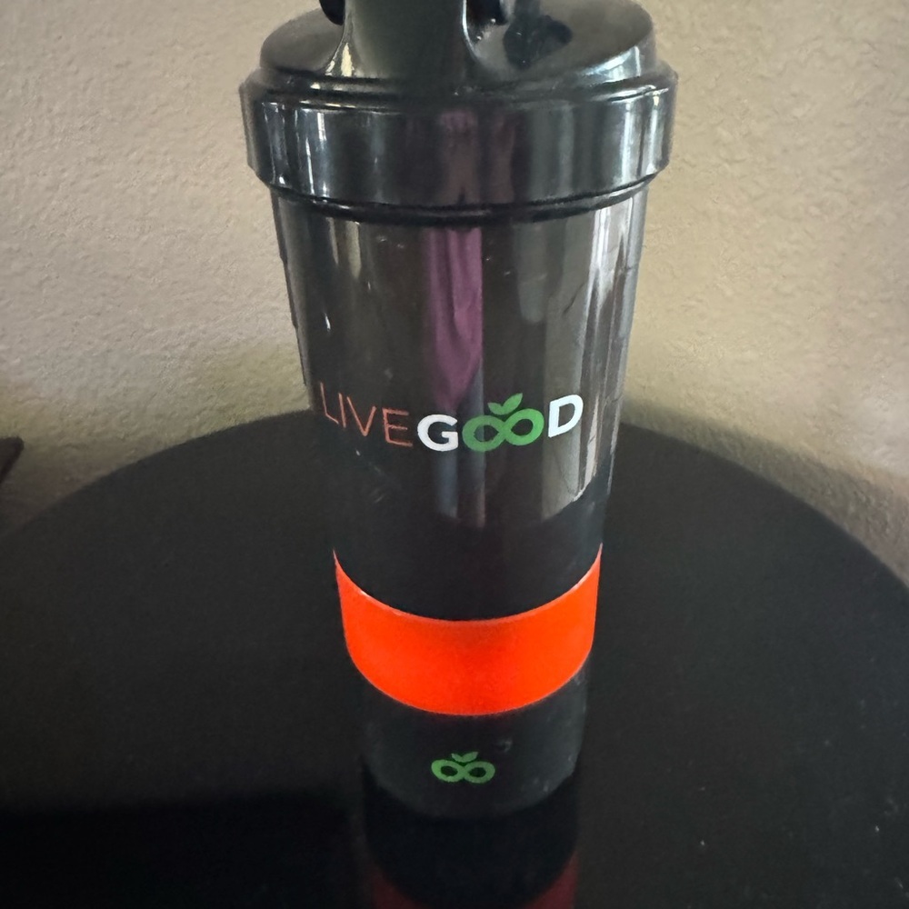 LiveGood Black Shaker Bottle with two compartments for supplements.